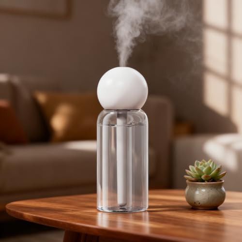 Portable intermittent spray travel humidifier
